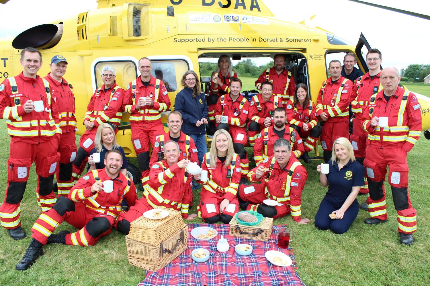 The Dorset and Somerset Air Ambulance crew enjoying a cuppa and cake.