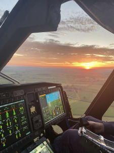 view from the cockpit air ambulance helicopter sunset