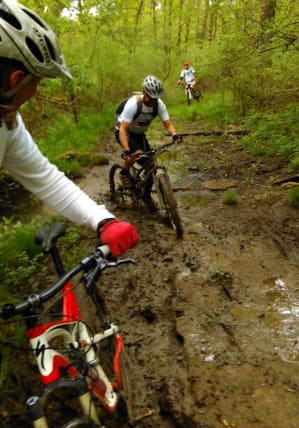 Dave Parker riding his bike through Mud